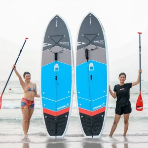 Stand up paddle standing on the beach